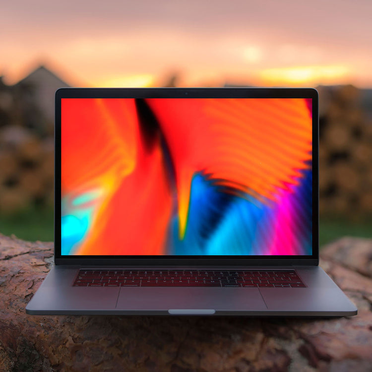 Apple computer with nature in the background