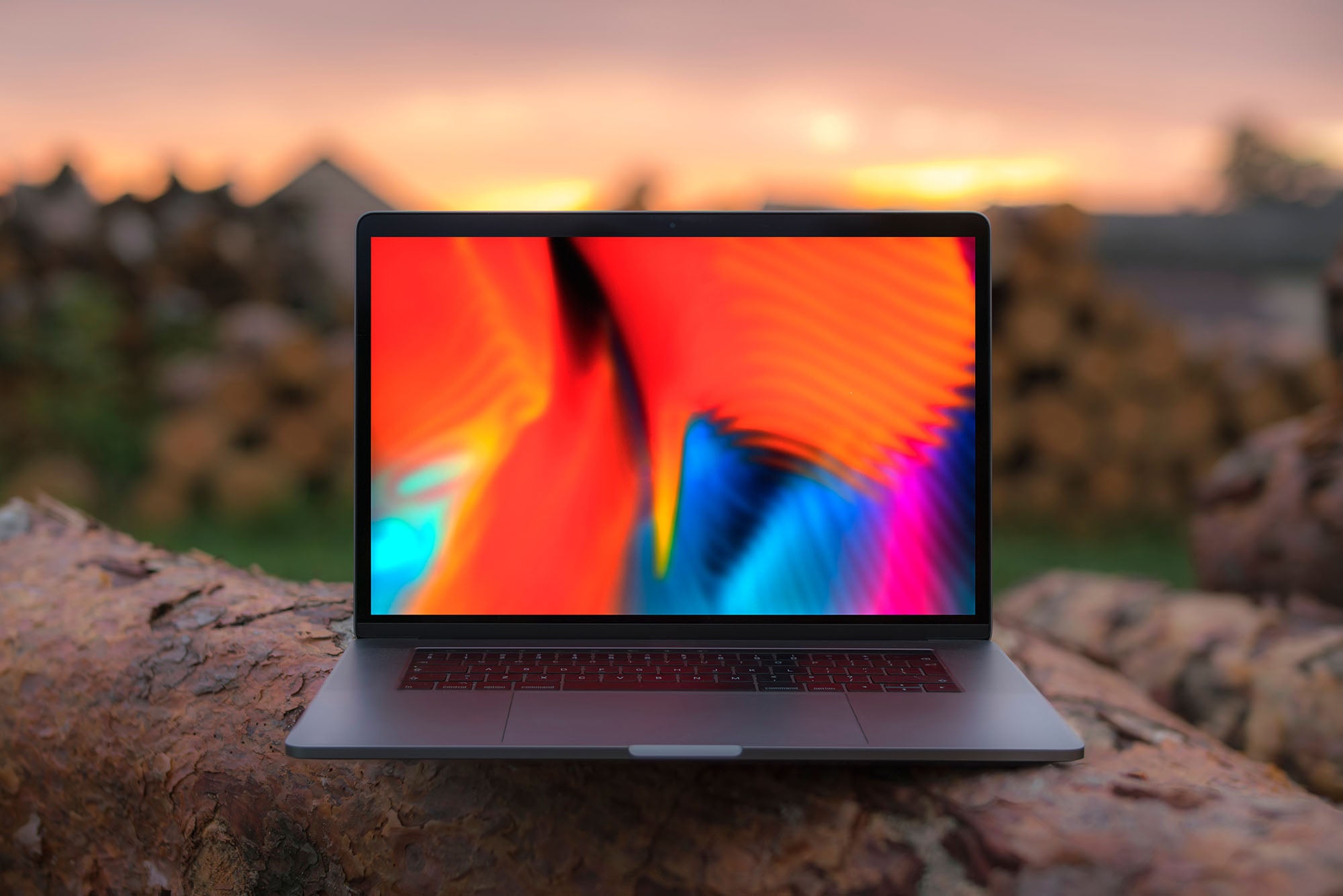 Apple computer with nature in the background